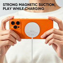 REDEFYNE charging pad held in hand with strong magnetic suction while charging