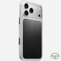 Nomad Clear case with black Horween leather panel on iPhone 18 Pro Max, rear view