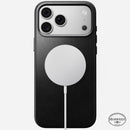 Angled view of the black Horween leather Nomad case on iPhone 18 Pro Max showing anodised aluminium side buttons