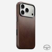 Nomad Traditional Horween leather case in rustic brown on iPhone 18 Pro, rear view