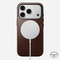 Angled view of the rustic brown Horween Nomad Traditional case on iPhone 18 Pro