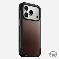 Nomad Rugged Horween leather case in rustic brown on iPhone 18 Pro, rear view
