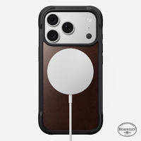 Angled view of the rustic brown Horween Nomad Rugged case on iPhone 18 Pro