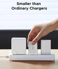 Spigen EE673OC 67W wall charger close-up of Spigen branding and port labelling