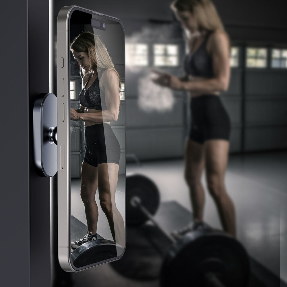 A2C MagSafe gym holder in use at gym - phone mounted at eye level on equipment