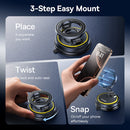 Baseus VC2 Flex mount installed on a curved leather car dashboard holding an iPhone.