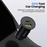 iQuick 48W charger compact profile alongside smartphone