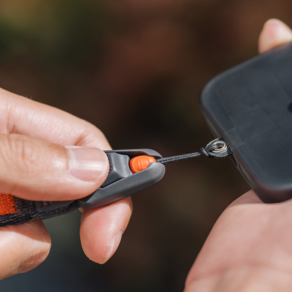 PGYTECH LinkGo quick release connector clipping onto a phone