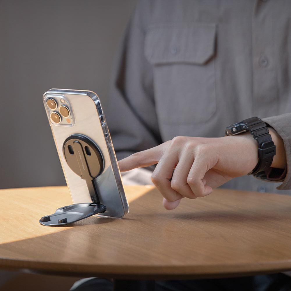 PGYTECH MagFlex standing an iPhone up on a table