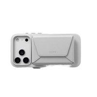Fold-out stand mode of the MOFT Snap Field Wallet holding a phone